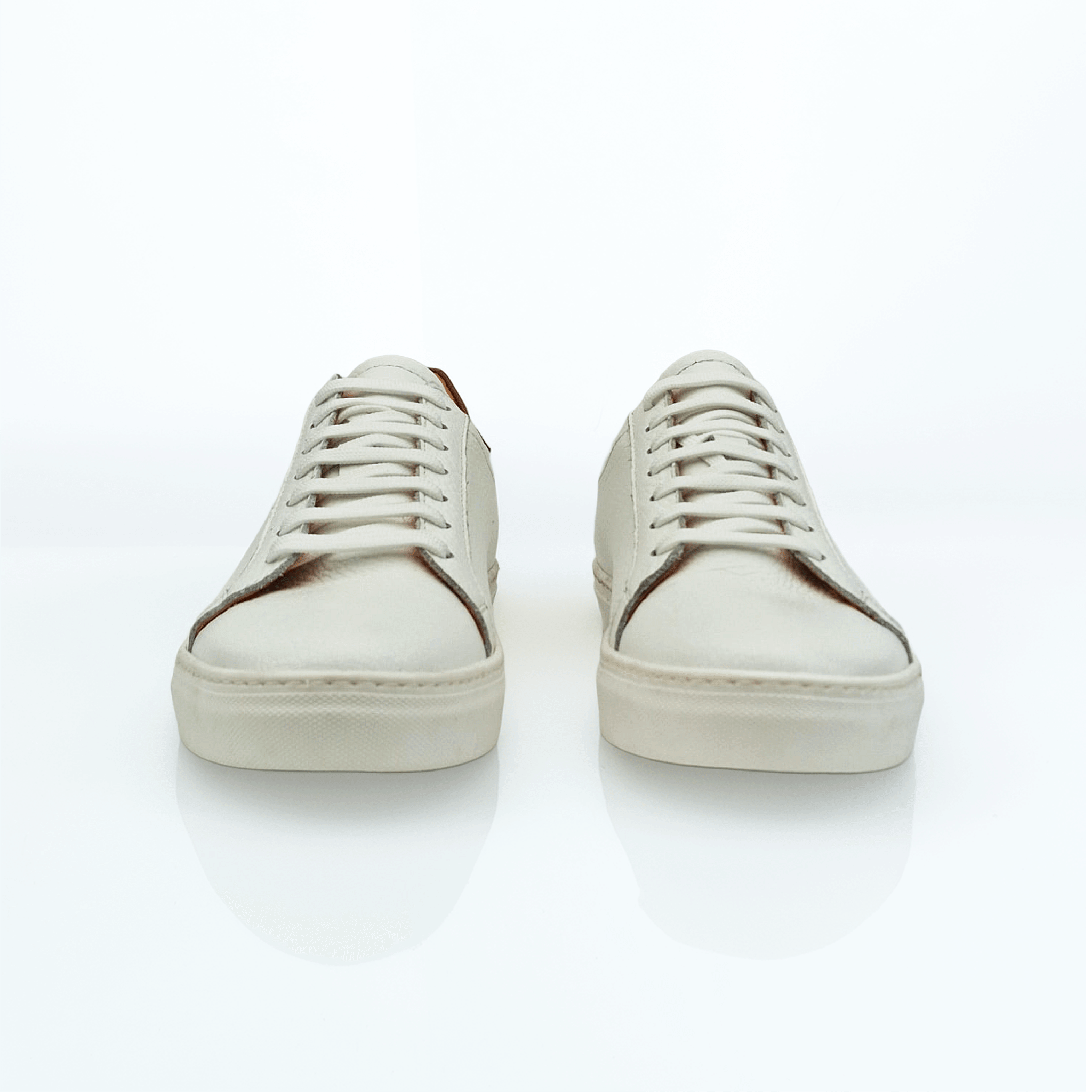 Sneakers Minimaliste in Pelle Bianca con Dettaglio Color Cuoio
